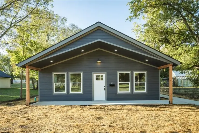 Front exterior and covered porch at 305 E Pacific St, Holden, Missouri - DRAT House 2