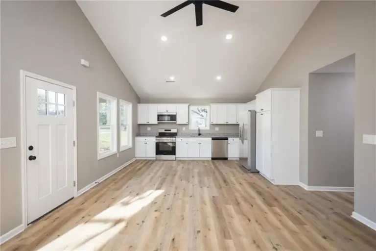 Open kitchen and living area at 305 E Pacific St, Holden, Missouri - DRAT House 2