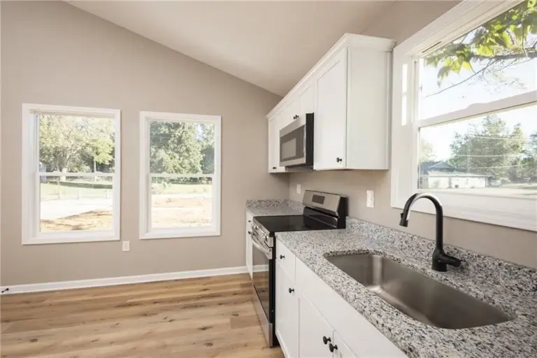 Kitchen sink and windows at 305 E Pacific St, Holden, Missouri - DRAT House 2