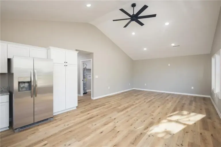 Kitchen and adjoining living area at 305 E Pacific St, Holden, Missouri - DRAT House 2