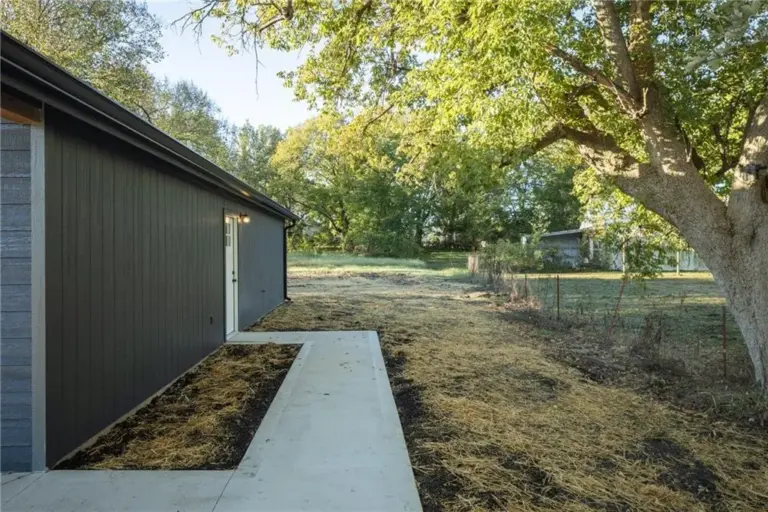 Side walkway and yard at 305 E Pacific St, Holden, Missouri - DRAT House 2