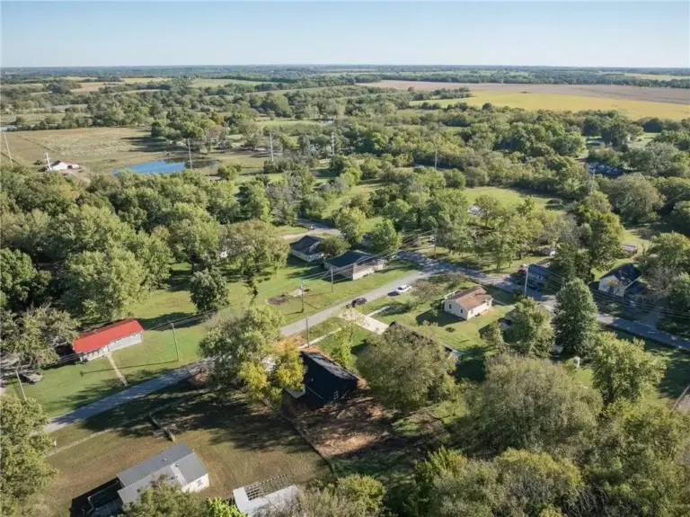 Aerial view of home and neighborhood at 305 E Pacific St, Holden, Missouri - DRAT House 2