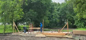 Early wall framing on the concrete slab at DRAT House #2 in Holden, Missouri