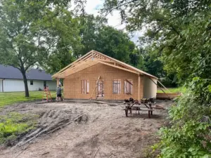 Wall sheathing and roof framing at DRAT House #2 in Holden, Missouri
