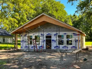 House wrap and window installation at DRAT House #2 in Holden, Missouri