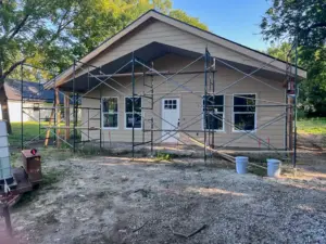 Exterior siding and trim in progress at DRAT House #2 in Holden, Missouri