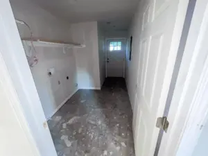 Mudroom drywall and shelving at DRAT House #2 in Holden, Missouri